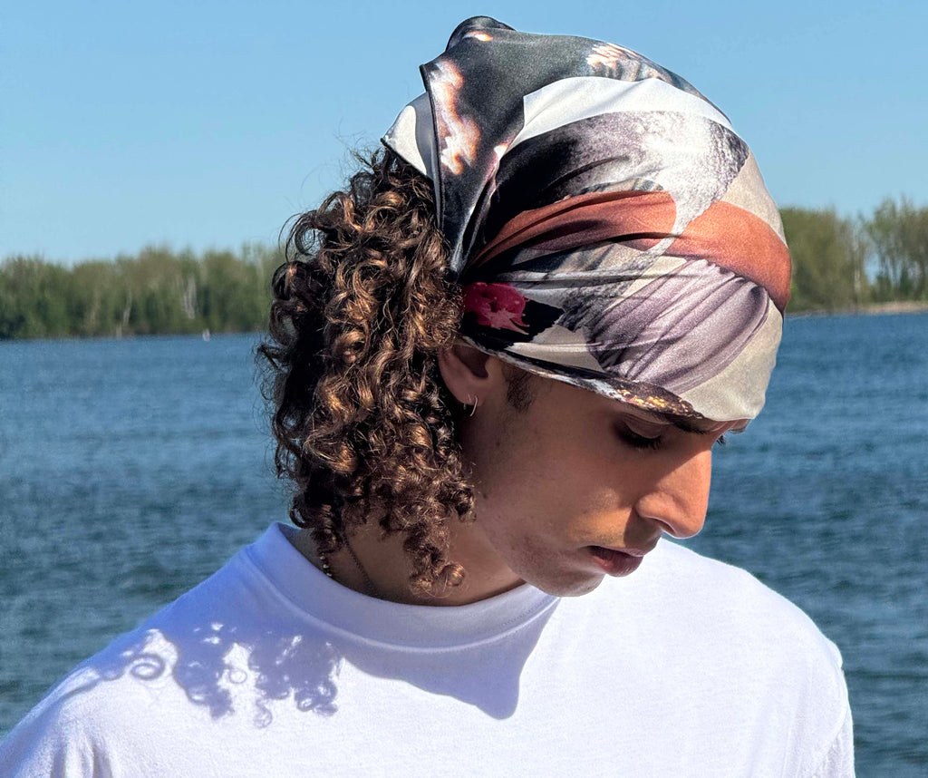 artistic, luxurious silk scarf with original collage art on top of an ocean scene, made in Canada