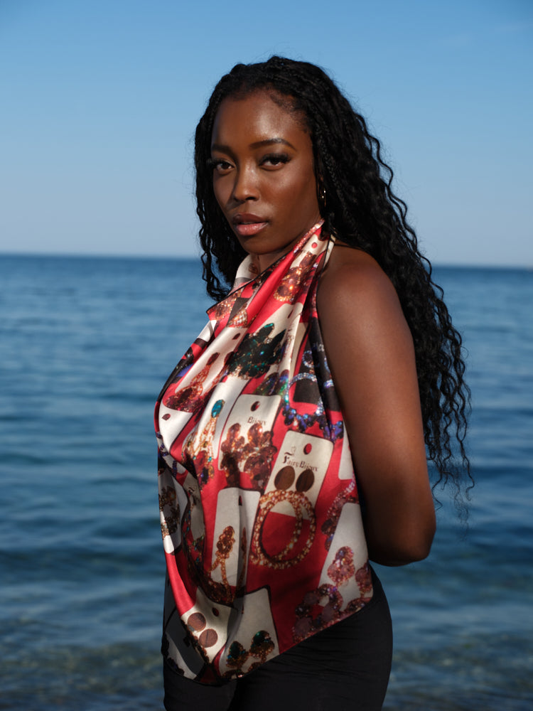 artistic, luxurious silk scarf with original photograph of colourful costume jewellery earrings on red background, made in Canada