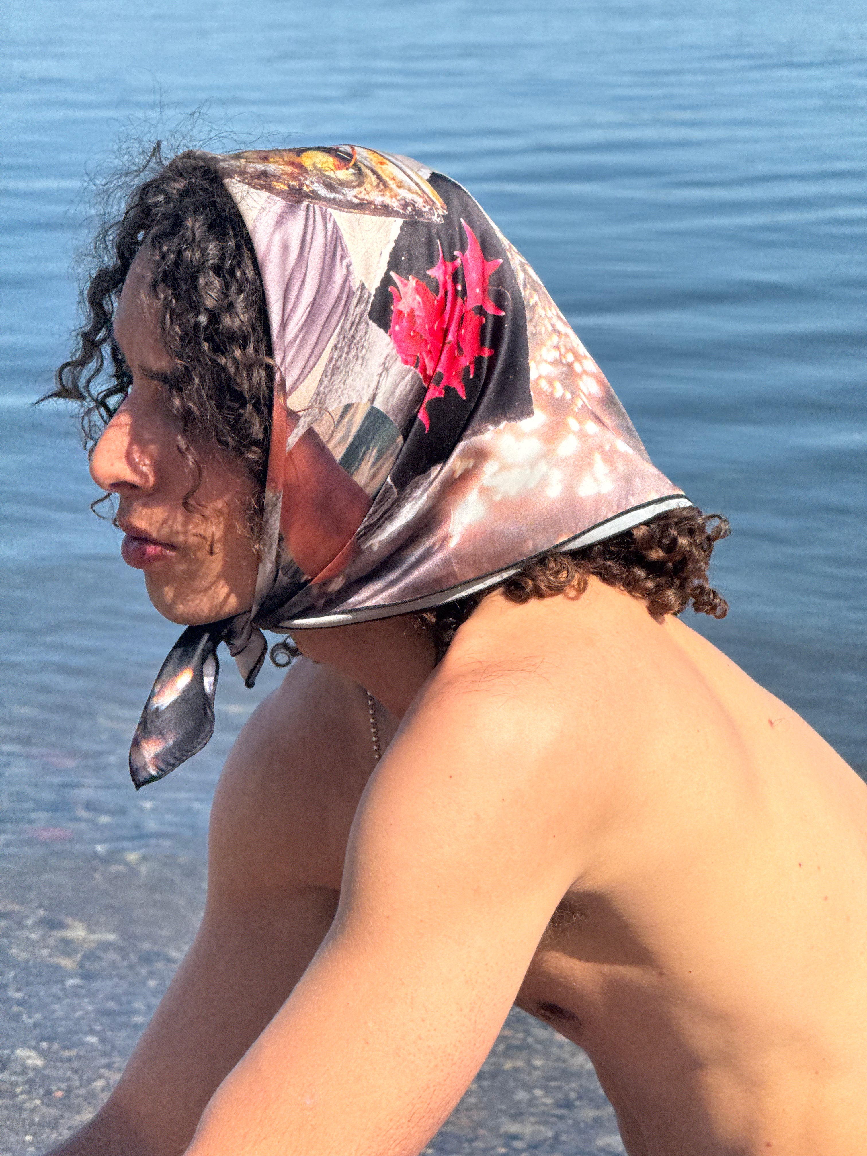 artistic, luxurious silk scarf with original collage art on top of an ocean scene, made in Canada