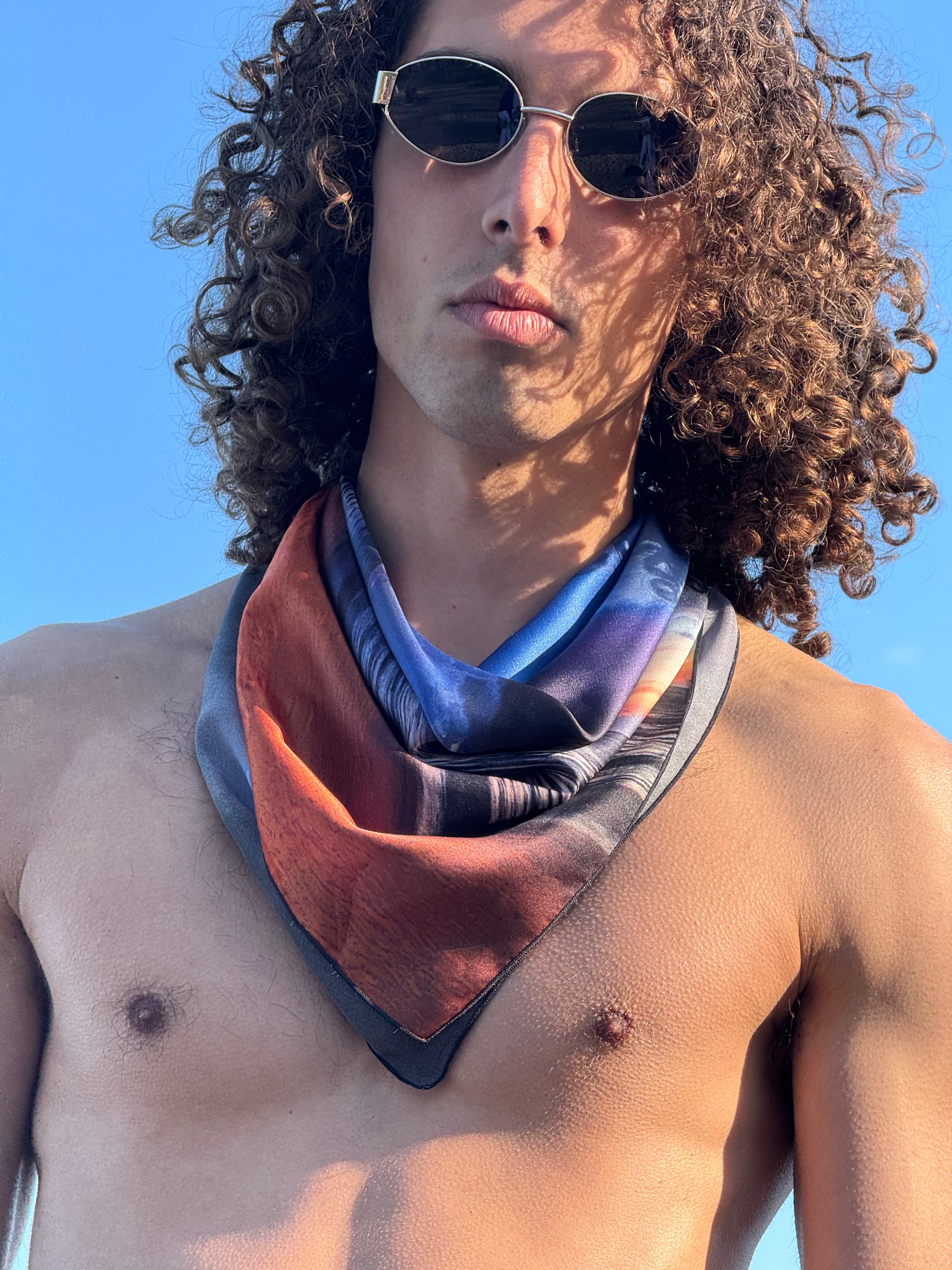 artistic, luxurious silk scarf with Jamaican sunset beach scene in blue and orange tones, made in Canada
