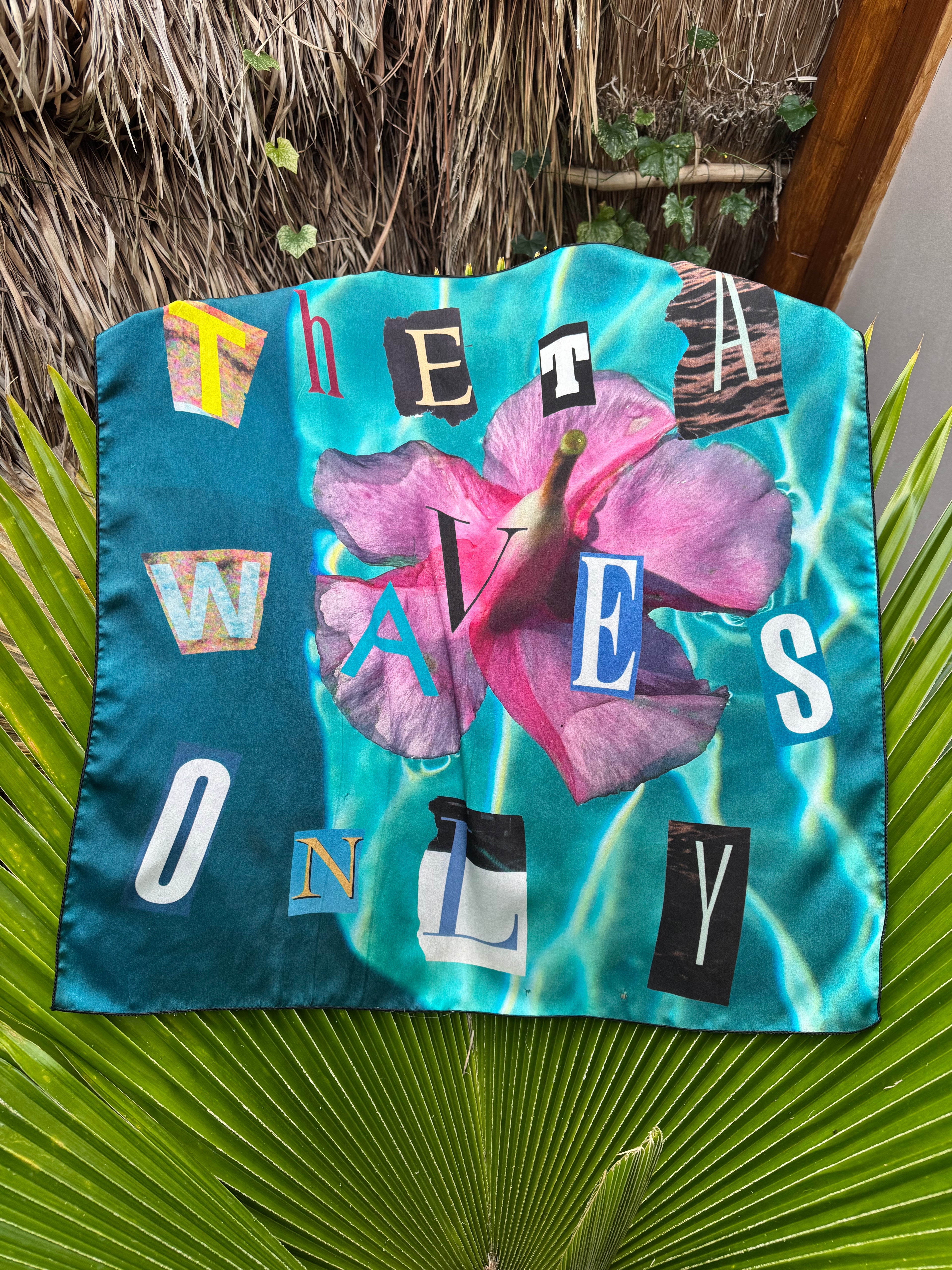 artistic, luxurious silk scarf featuring stunning pinks and blues with poetic collaged text, made in Canada
