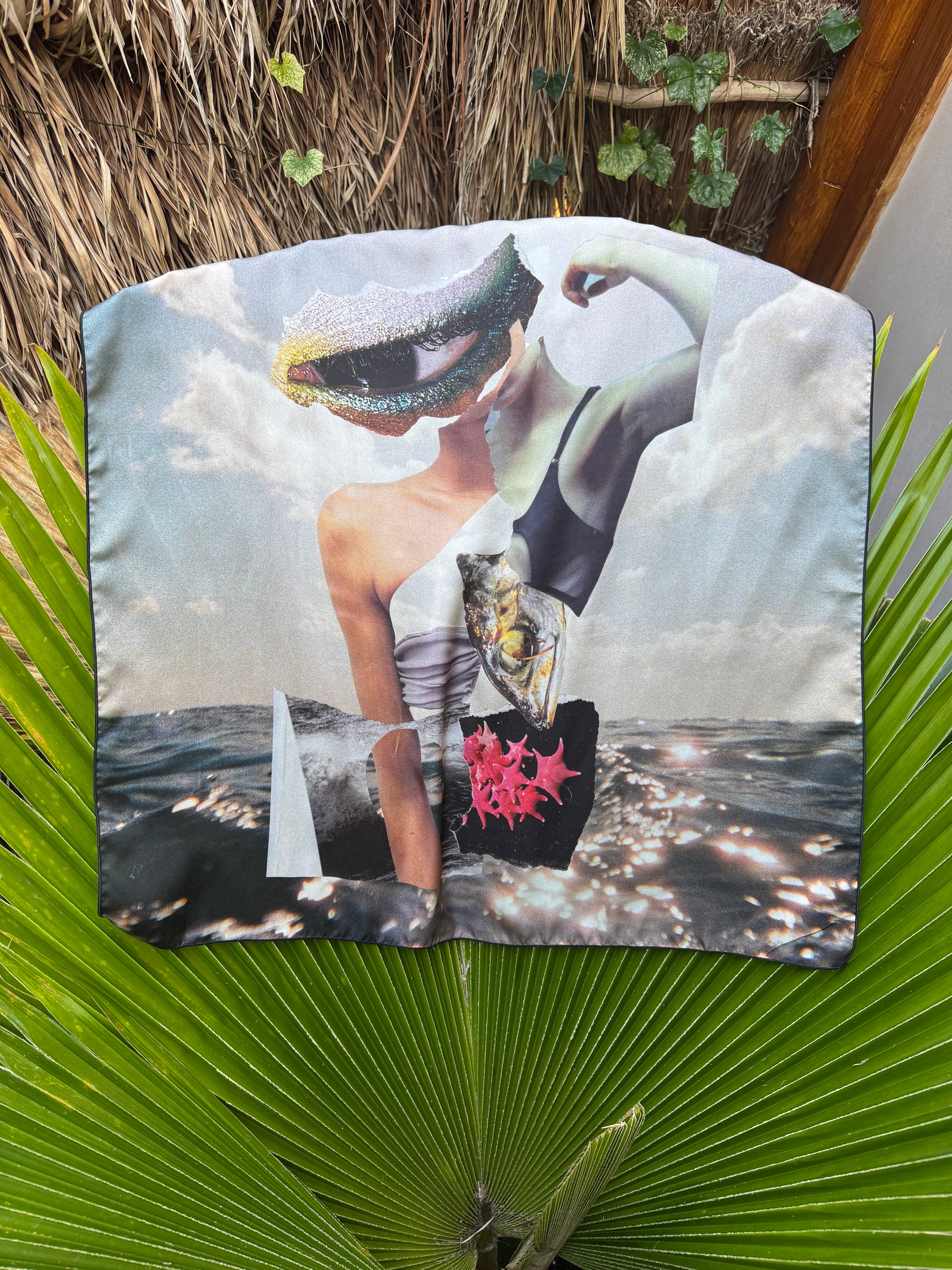 artistic, luxurious silk scarf with original collage art on top of an ocean scene, made in Canada