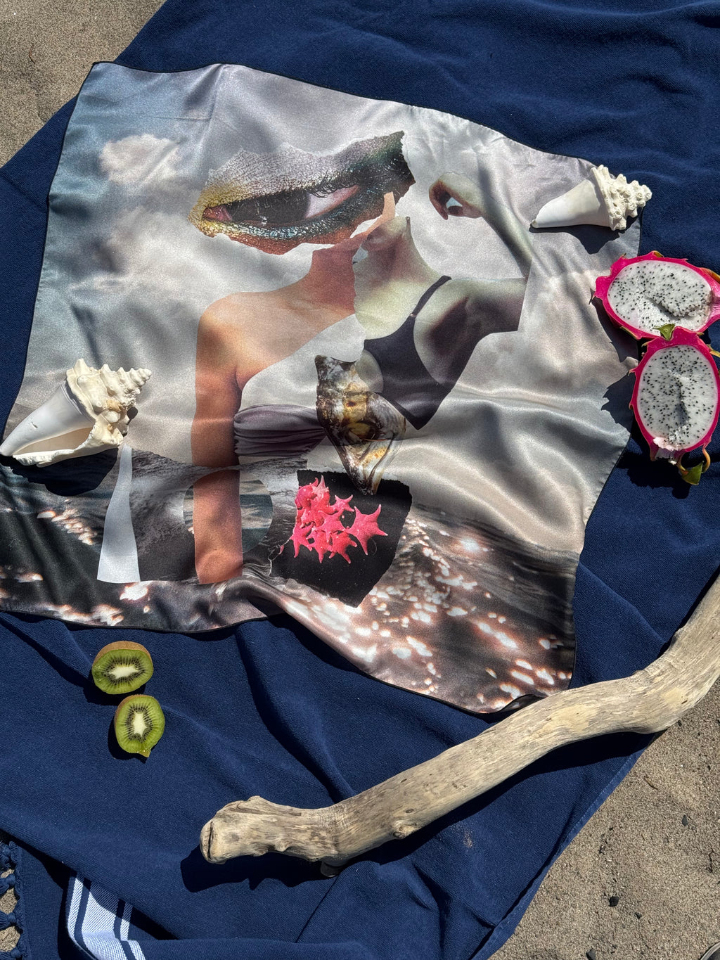 artistic, luxurious silk scarf with original collage art on top of an ocean scene, made in Canada