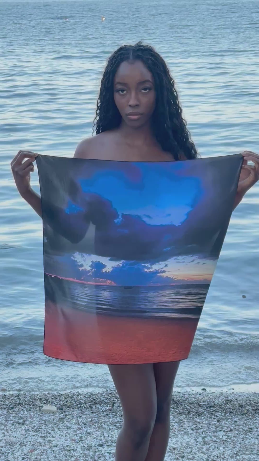 artistic, luxurious silk scarf with Jamaican sunset beach scene in blue and orange tones, made in Canada